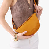 Sunshine Small | Model wear half circle shaped sling bag