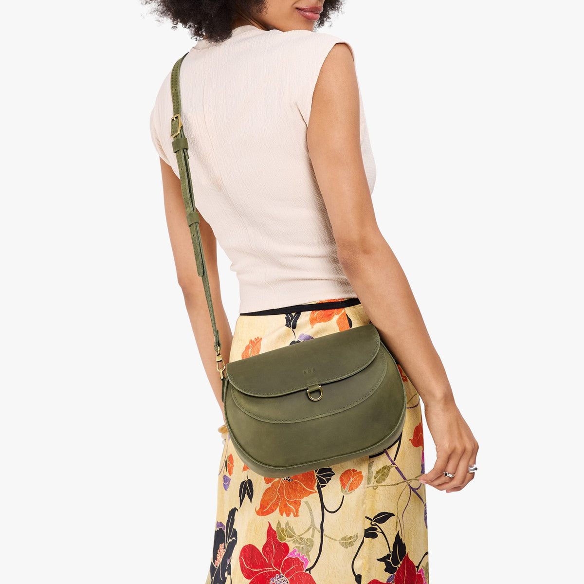 Old Growth*Large | Model wearing a leather Crossbody with a flap and magnetic closure