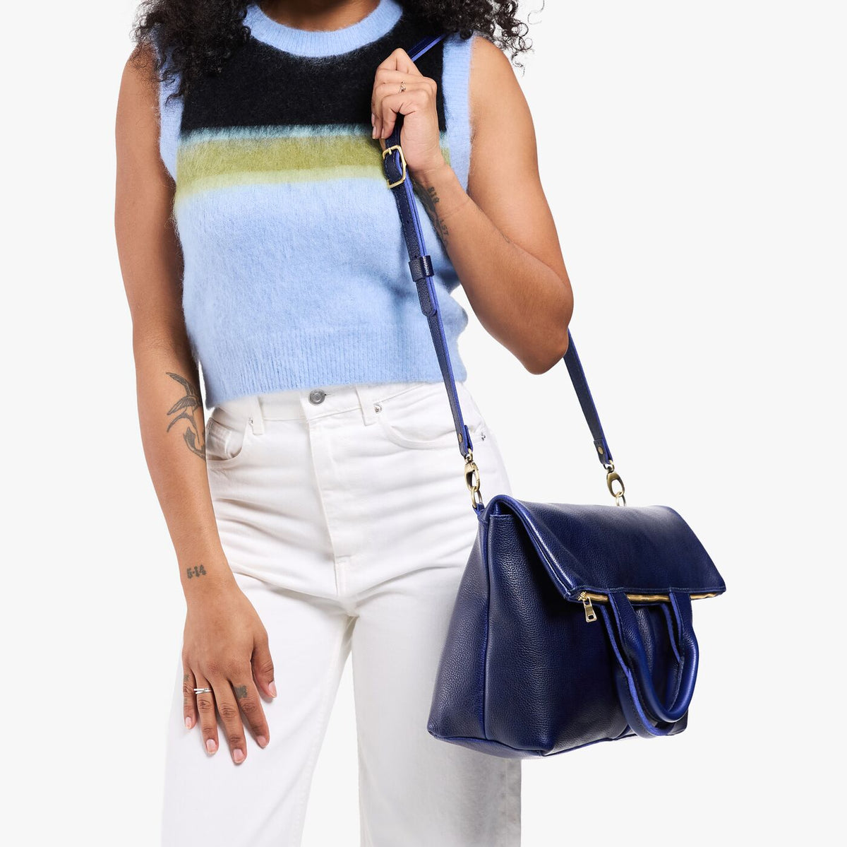 Cobalt*Large | Model wearing a convertible tote clutch crossbody