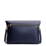 Cobalt Large | Convertible tote clutch crossbody with a back zipper pocket folded into a clutch