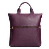 Plum Large | Convertible tote clutch crossbody with a front zipper pocket and top carry handles