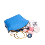 Skydive Large | Seashell shaped leather makeup bag with curved top zipper and flat bottom