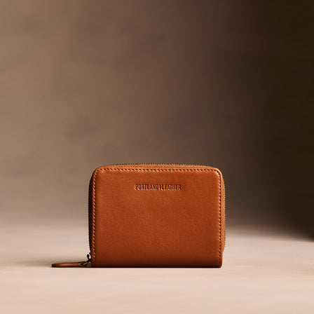 Vintage Tan | Wallet with card and storage pockets on a light brown background