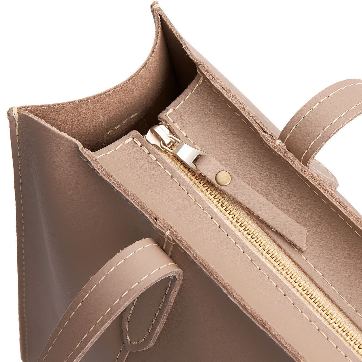 Stone | Closeup of tote bag's zipper closure