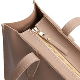 Stone | Closeup of tote bag's zipper closure