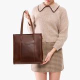 Cognac North/South | Structured large tote bag with overlapping panels and crossbody strap
