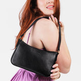 Pebbled--black Small | Petite bean shaped shoulder bag with a zipper closure
