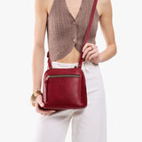 All Variants | A model wearing a Medium luna Crossbody