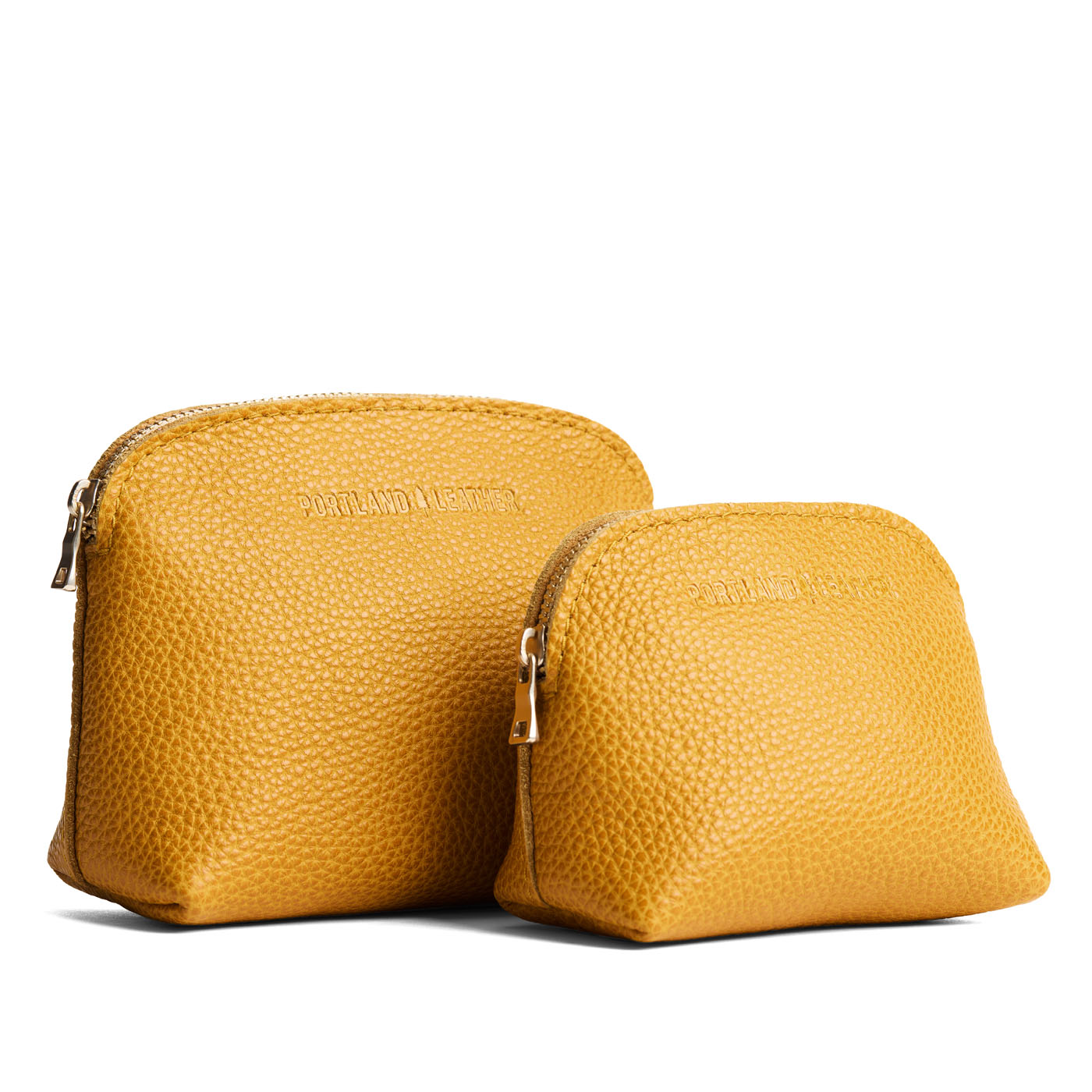 Sunshine | Comparison view of small and large compact leather pouches with top zippers