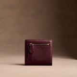 Hunter Small | Petite slim leather bifold wallet with multiple card slots and a zippered back pocket - back view