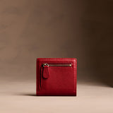 Icon Red Small | Petite slim leather bifold wallet with multiple card slots and a zippered back pocket - back view
