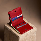 Icon Red Small | Petite slim leather bifold wallet with multiple card slots and a zippered back pocket