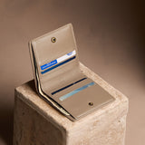 Satine Small | Petite slim leather bifold wallet with multiple card slots and a zippered back pocket