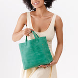 Reef | Midsize crossbody tote with handles and a pocket
