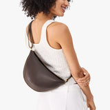 Grizzly Medium | Model wearing petite half circle shaped sling bag