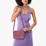 Hollyhock | Model wearing leather Crossbody Bag with Magnetic Messenger Bag Closure