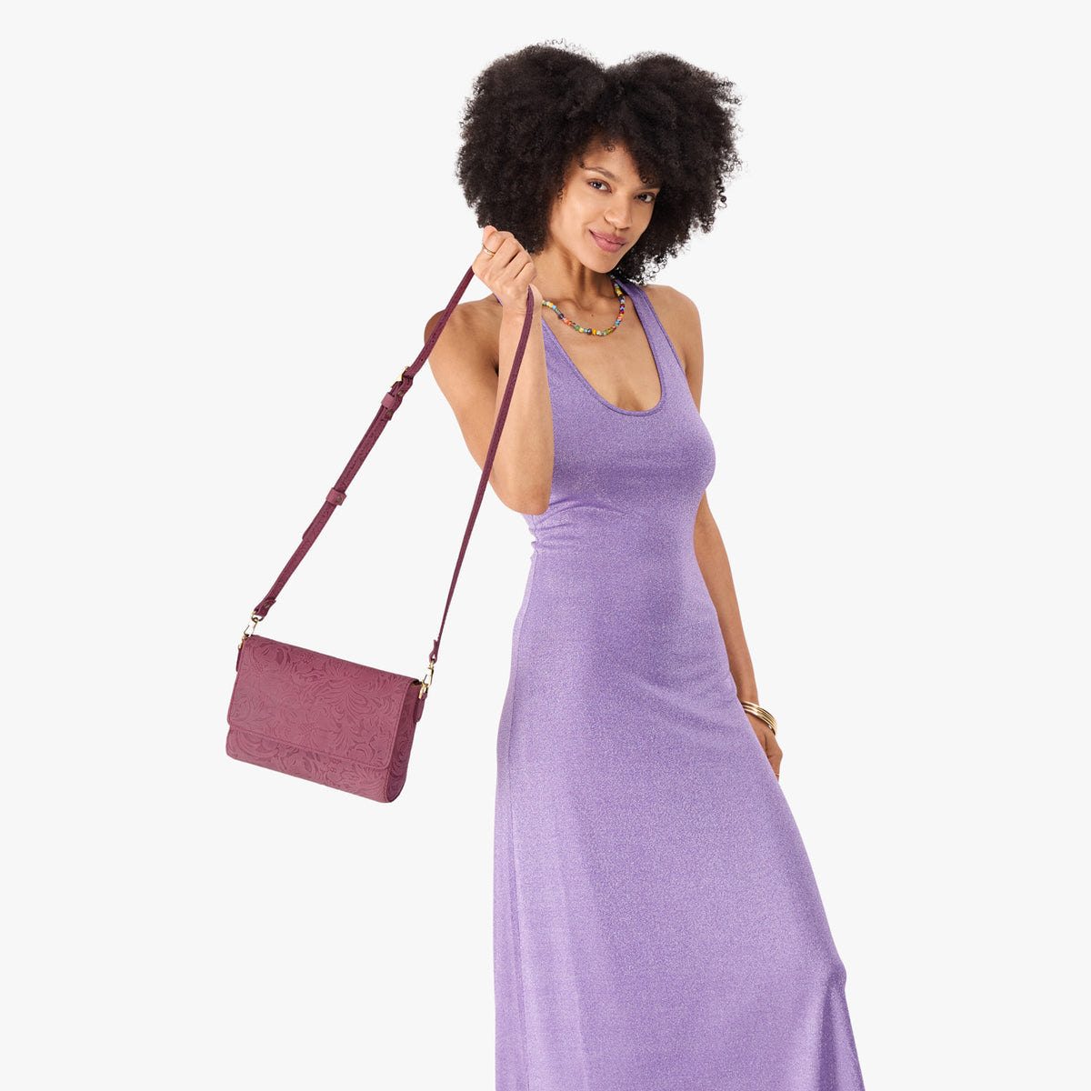 Hollyhock | Model wearing leather Crossbody Bag with Magnetic Messenger Bag Closure