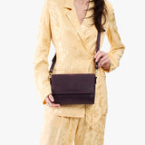 Larkspur Medium | Model wearing leather Crossbody Bag with Magnetic Messenger Bag 