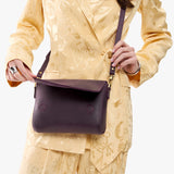 Larkspur Medium | Model wearing leather Crossbody Bag with Magnetic Messenger Bag 