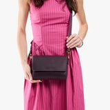 Larkspur Mini | Model wearing leather Crossbody Bag with Magnetic Messenger Bag 