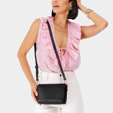 Black Mini | Model Wearing Small Leather Crossbody Bag with Magnetic Messenger Bag Closure