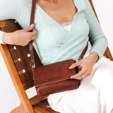Nutmeg Mini | Model Wearing Small Leather Crossbody Bag with Magnetic Messenger Bag Closure