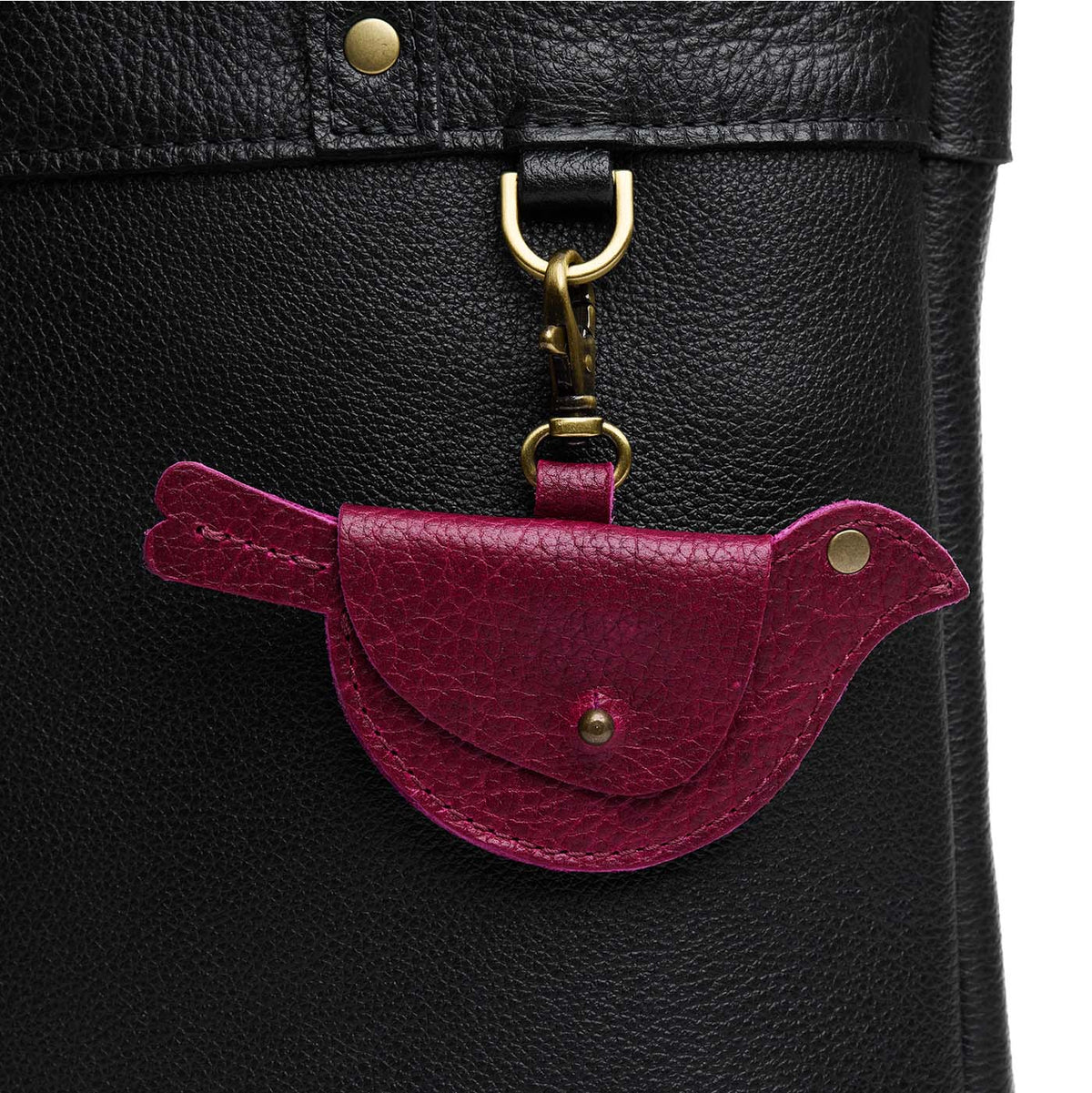 Orchid | Bird shaped pouch with button closure and lobster clasp