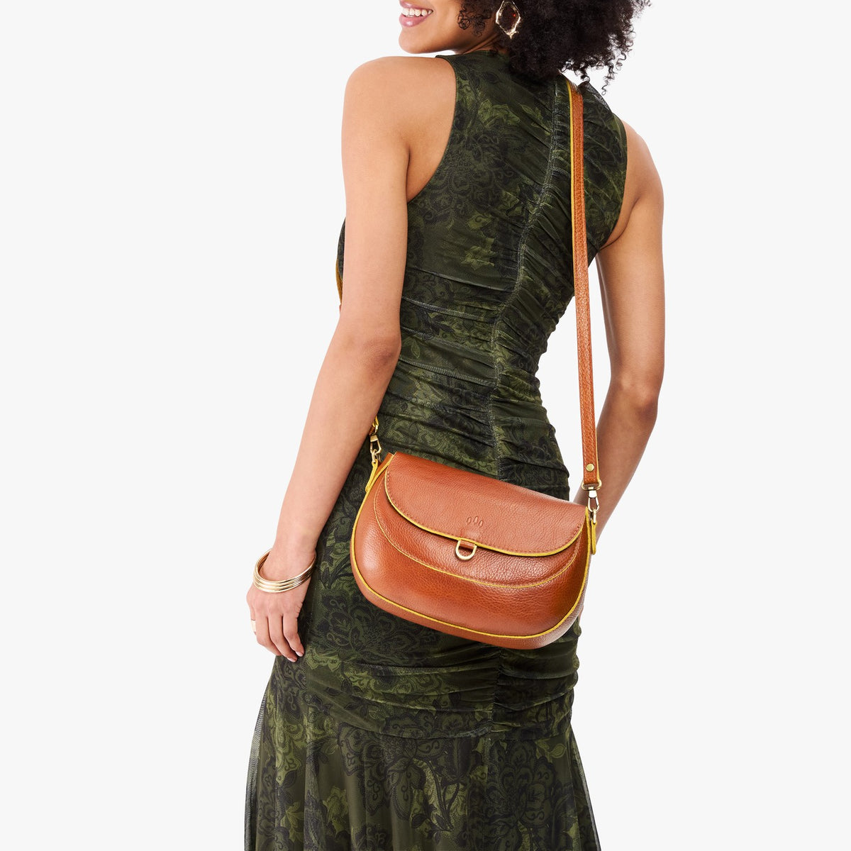 Sienna*Large | Model wearing a leather Crossbody with a flap and magnetic closure