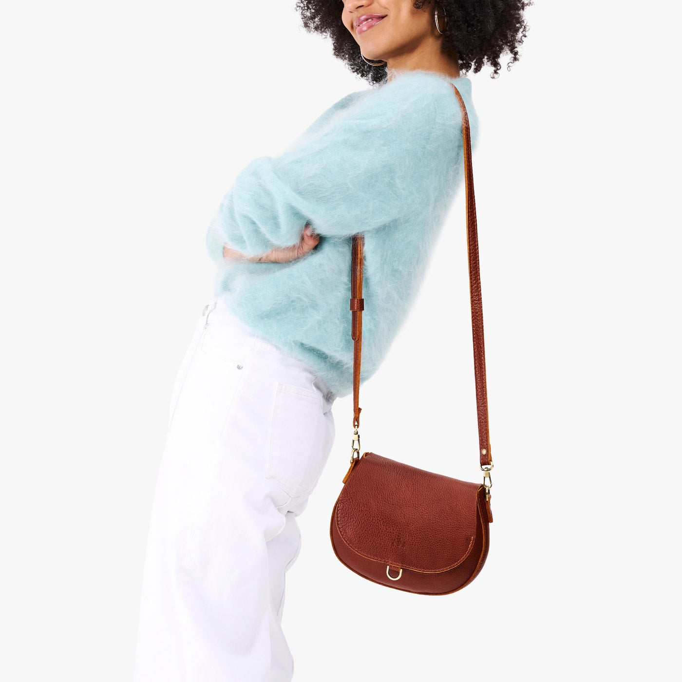Sm Monaco Crossbody Mystery | Model wearing a petite leather Crossbody with a flap and magnetic closure