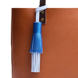 Skyway | A two tiered fringe tassel on a Tote Bag