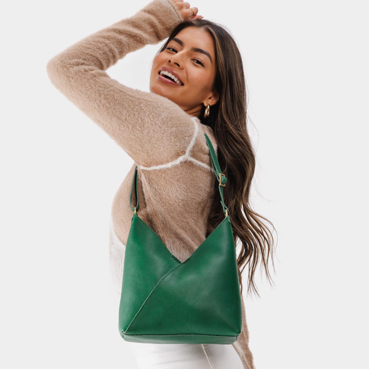 Bacalar*Small | Model wearing petite shoulder bag with adjustable strap and magnetic snap closure