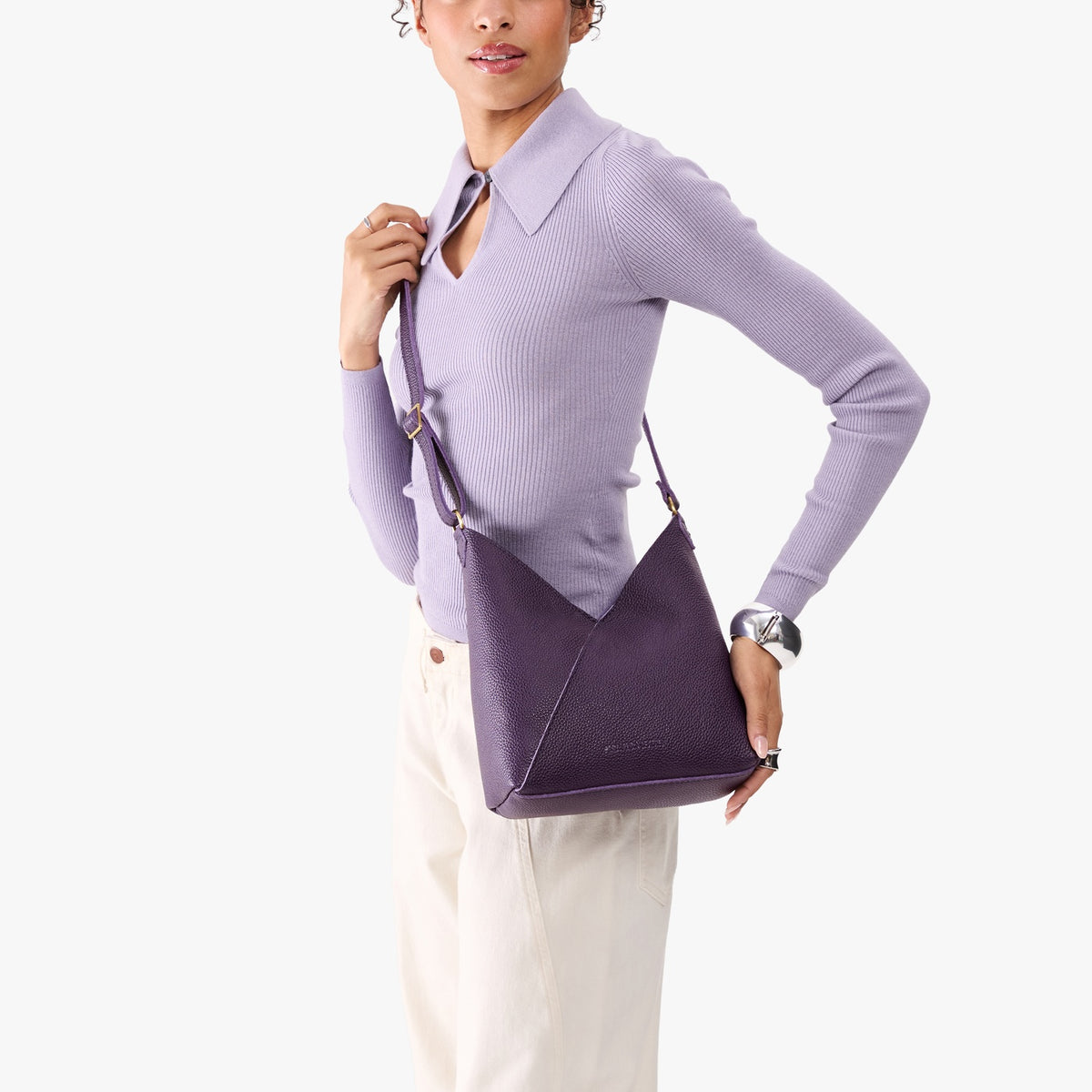 Empire*Small | Model wearing petite shoulder bag with adjustable strap and magnetic snap closure