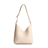 Pebbled Bone Small | Petite shoulder bag with adjustable strap and magnetic snap closure