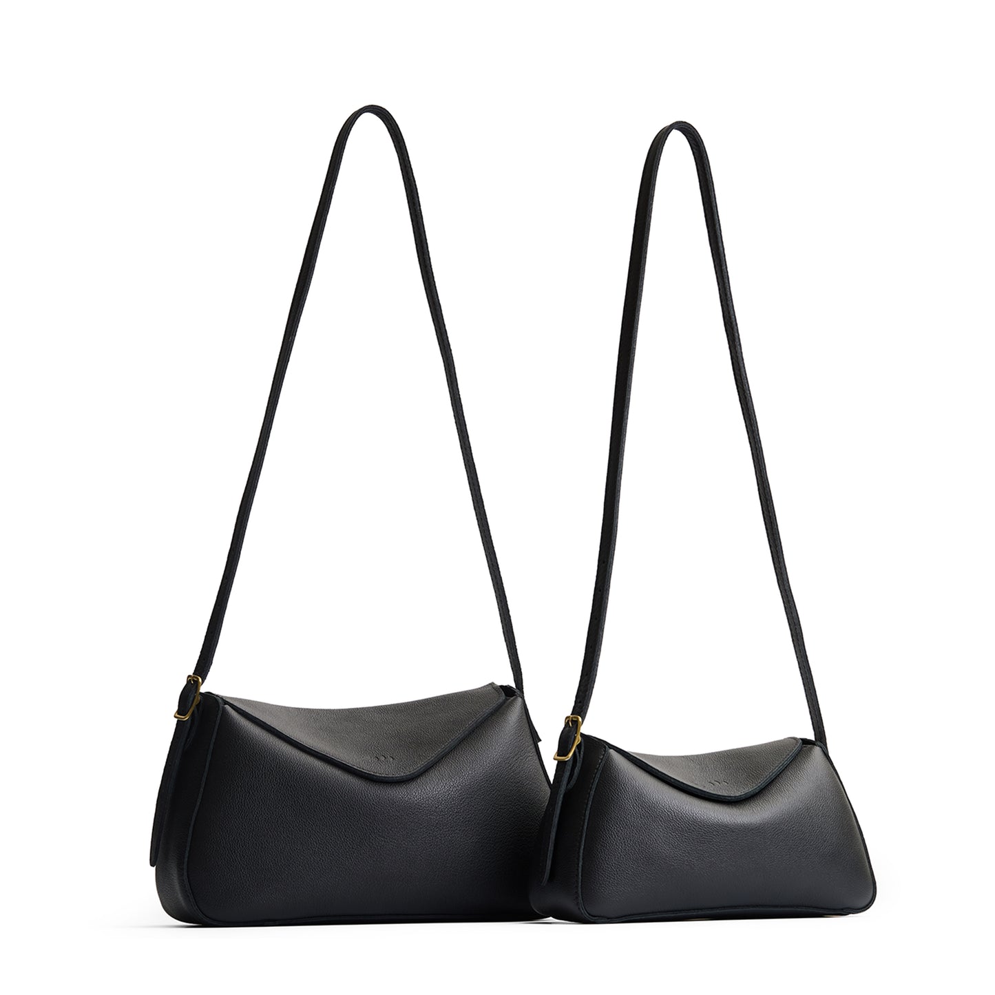 Pebbled--black | Size comparison image of small and medium Neruda Crossbody