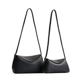 Pebbled--black | Size comparison image of small and medium Neruda Crossbody