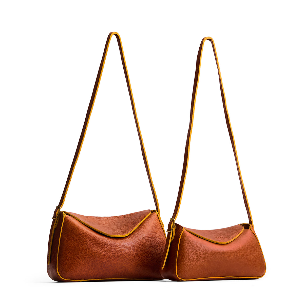 Sienna | Size comparison image of small and medium Neruda Crossbody