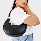 Pebbled--black Small | Crescent shaped shoulder bag with zipper closure and adjustable strap