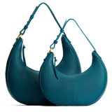 Aquarius | Crescent shaped shoulder bag with zipper closure and adjustable strap