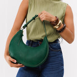 Bacalar Small | Crescent shaped shoulder bag with zipper closure and adjustable strap