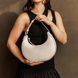 Bone Small | Crescent shaped shoulder bag with zipper closure and adjustable strap