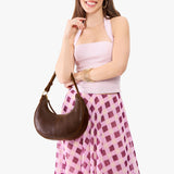 Coldbrew Small | Crescent shaped shoulder bag with zipper closure and adjustable strap
