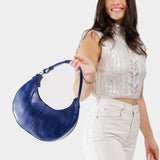 Cowboy Blue Small | Crescent shaped shoulder bag with zipper closure and adjustable strap