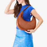 Honey Large | Crescent shaped shoulder bag with zipper closure and adjustable strap