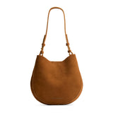 Jackson Medium | Rounded shoulder bag with adjustable strap on a white background