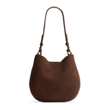 Stagecoach Medium | Rounded shoulder bag with adjustable strap on a white background
