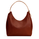 Nutmeg Oversized | U-shaped, flat-bottomed leather shoulder bag with adjustable strap