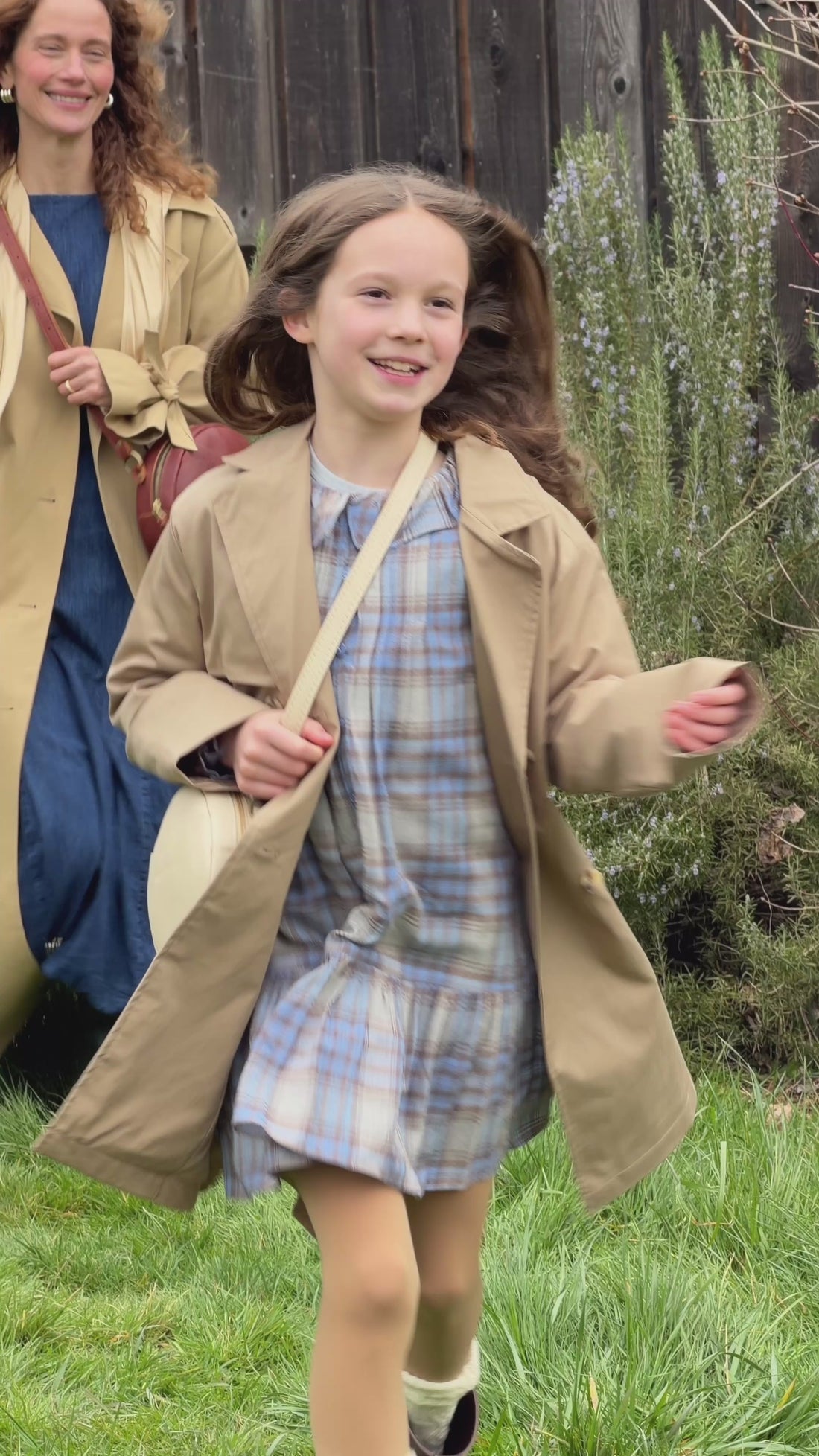 Video of a woman and child on a farm with sheep showing off the Circle Crossbody bag, Olivia Shoulder bag, Petal Crossbody, and Sunnie Crossbody