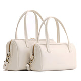 Bone Small | Two sizes of mini duffle shaped handbag with crossbody strap
