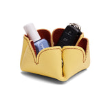 Koi | Desert bell-shaped foldable leather tray with snap-button corners holding items