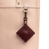 Cognac | Diamond shaped leather AirTag holder on a lobster clasp keychain